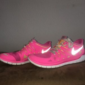 Pink Nike frees